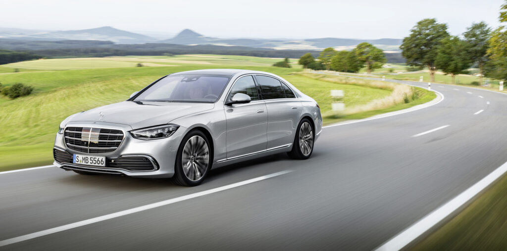 Silver Benz at speed
