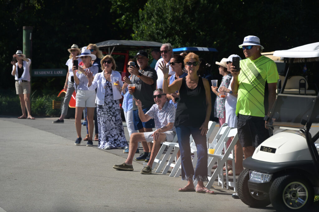Spectators line the route of the Ocean Reef Vehicle Parade.