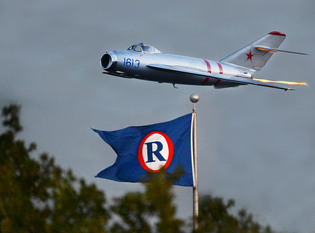 MiG 17 flies by the ORC flag.