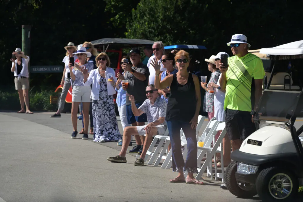 Spectators line the route of the Ocean Reef Vehicle Parade.
