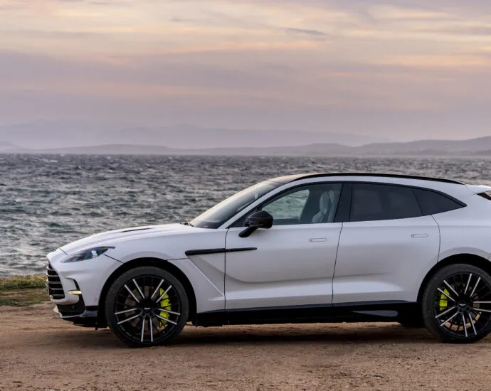 Aston Martin DBX707 against the water